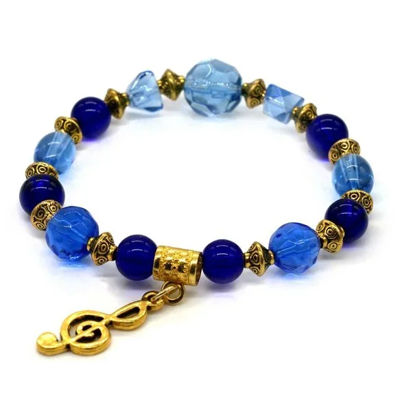 Bracelet with Gold Pendant and blue crystals. - Picture 1 of 1